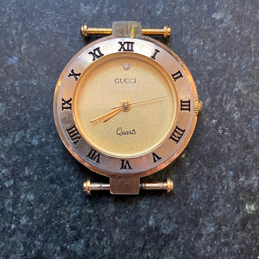 Vintage Gucci Women’s Gold Watch Face with Roman Numerals